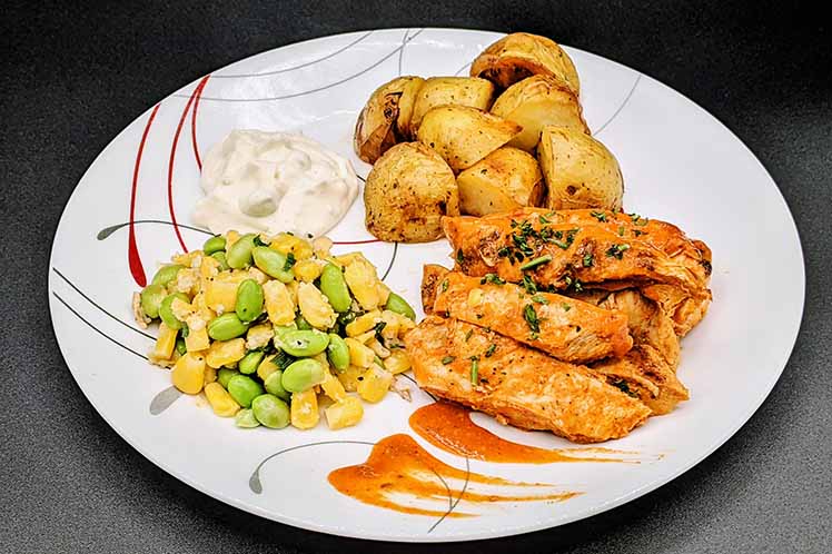 Grilled Buffalo Chicken with Oven Fries and Succotash