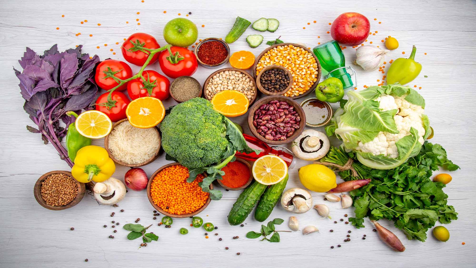 fresh-greens-colorful-vegetables-white-table